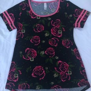 LuLaRoe Classic tee, pink rose pattern on black shirt.